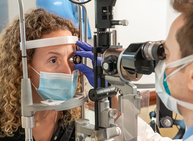 Photo of Dara Lehon having eye exam