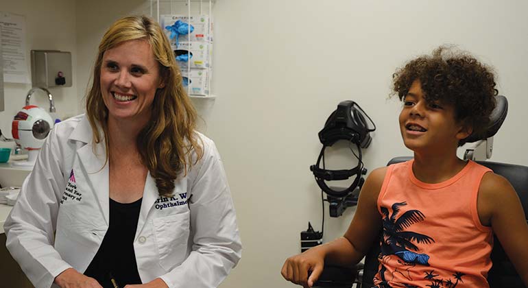 Image of doctor with young patient