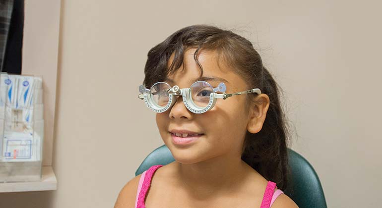 Young girl in exam room