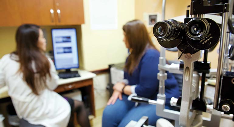 Image of patient talking to female doctor