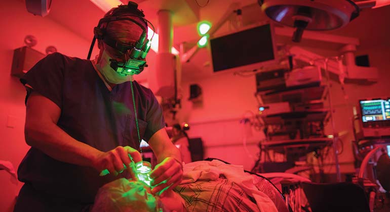 Image of doctor performing surgery on patient