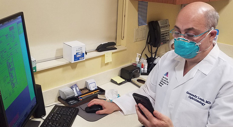 doctor researches information a computer